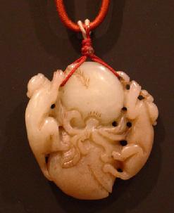Celadon and Brownish-Jade Peach and Monkey Group Pendant on a Silk Double Cord - Closeup Reverse View