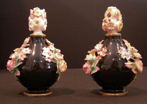 Pr. 19th c. Jacob Petit Black-Ground Flower-Encrusted Scent Bottles and Stoppers